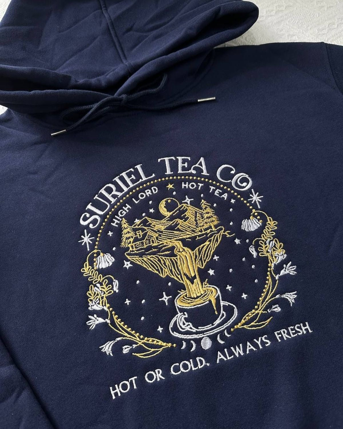 Suriel Tea Co Hoodie, ACOTAR Embroidered Pullover, High Lord Hot Tea Design, Fantasy Bookish Gift, Cozy Reader Hoodie VEMB51